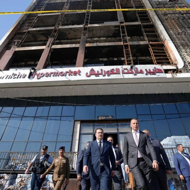 Six local officials detained over Iraq deadly mall fire