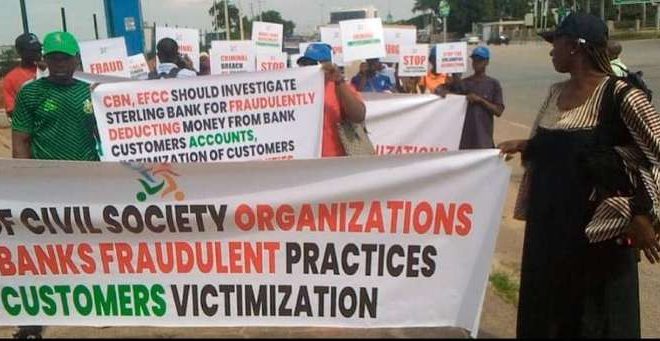 CSOs protest at CBN HQs, accuse Sterling Bank of fraud, exploiting customers